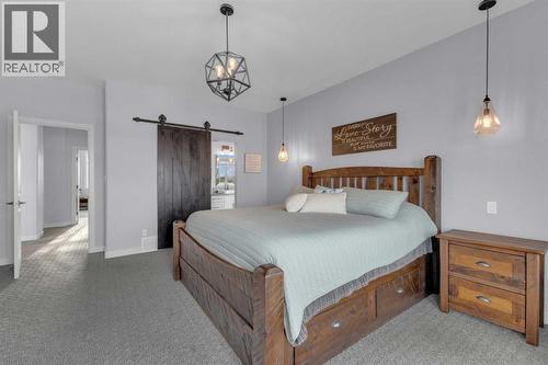 5 Leonard Close, Sylvan Lake, AB - Indoor Photo Showing Bedroom