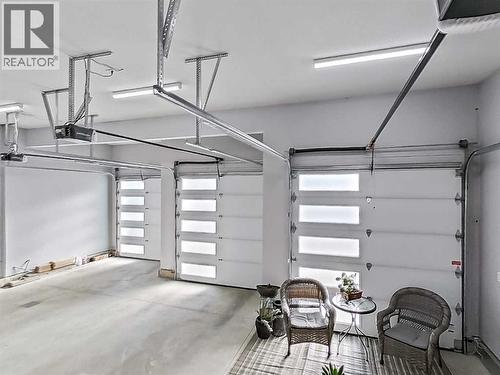 5 Leonard Close, Sylvan Lake, AB - Indoor Photo Showing Garage