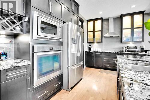 60 Cranarch Rise Se, Calgary, AB - Indoor Photo Showing Kitchen With Stainless Steel Kitchen With Upgraded Kitchen