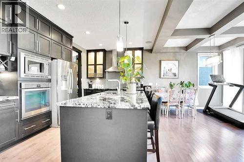 60 Cranarch Rise Se, Calgary, AB - Indoor Photo Showing Kitchen With Upgraded Kitchen