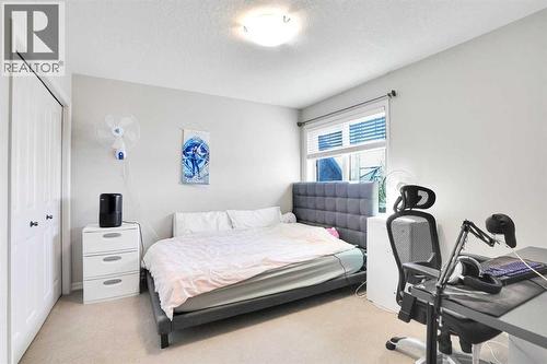 60 Cranarch Rise Se, Calgary, AB - Indoor Photo Showing Bedroom