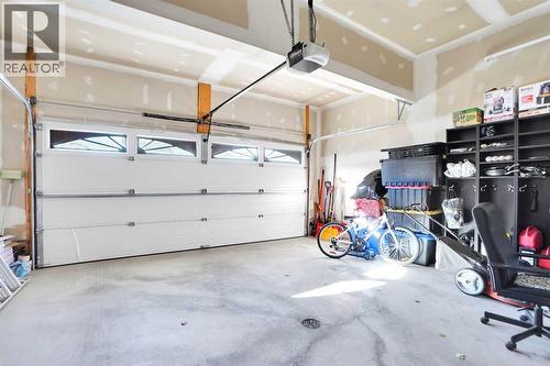 60 Cranarch Rise Se, Calgary, AB - Indoor Photo Showing Garage