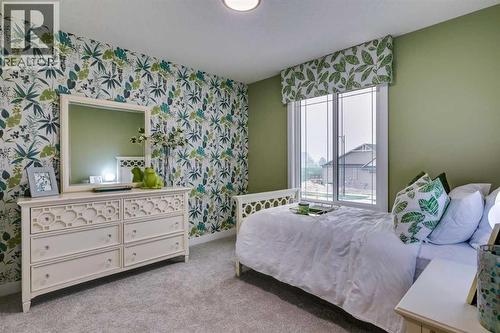 71 Emerson Crescent, Okotoks, AB - Indoor Photo Showing Bedroom