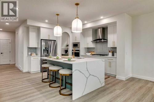 71 Emerson Crescent, Okotoks, AB - Indoor Photo Showing Kitchen With Stainless Steel Kitchen With Upgraded Kitchen