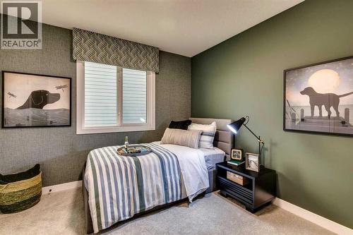 71 Emerson Crescent, Okotoks, AB - Indoor Photo Showing Bedroom