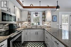 Spacious kitchen perfect for cooking and gathering - 
