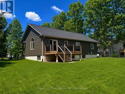 Spacious back yard backs onto woodland - 