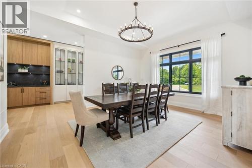 Dining space with light wood finished floors, a chandelier, recessed lighting, and baseboards - 5020 First Line, Erin, ON - Indoor Photo Showing Dining Room