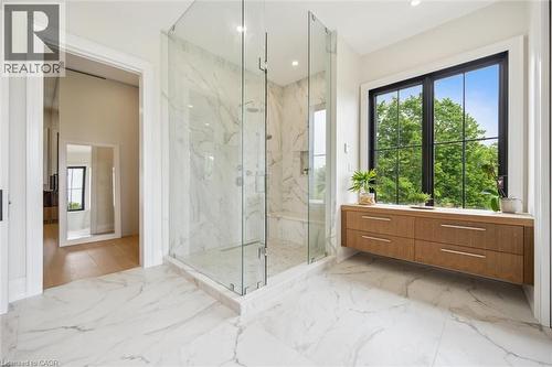 Bathroom featuring a marble finish shower, marble tiled floors, healthy amount of natural light, vanity, and recessed lighting - 5020 First Line, Erin, ON - Indoor Photo Showing Bathroom