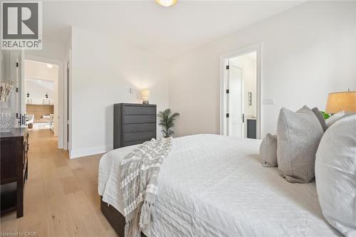 Bedroom with light wood-style flooring and baseboards - 5020 First Line, Erin, ON - Indoor Photo Showing Bedroom