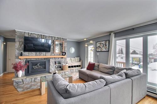 Salon - 1577 Rue Lawlis, Val-D'Or, QC - Indoor Photo Showing Living Room With Fireplace