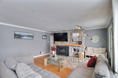 Salon - 1577 Rue Lawlis, Val-D'Or, QC - Indoor Photo Showing Living Room With Fireplace