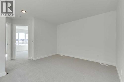 182 Lanark Gate Se, Airdrie, AB - Indoor Photo Showing Other Room