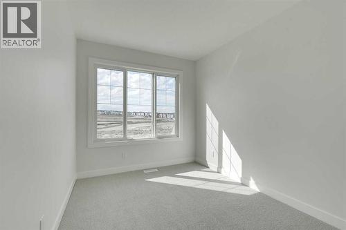182 Lanark Gate Se, Airdrie, AB - Indoor Photo Showing Other Room