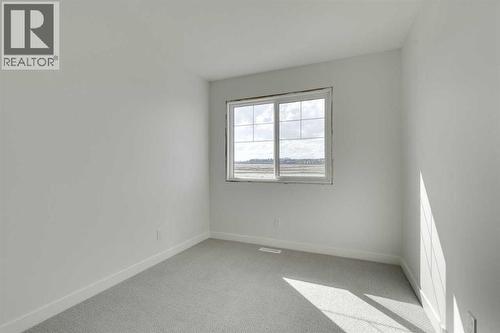 182 Lanark Gate Se, Airdrie, AB - Indoor Photo Showing Other Room