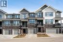 915 Crestridge Common Sw, Calgary, AB  - Outdoor With Balcony With Facade 