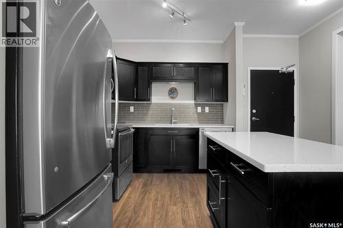216 545 Hassard Close, Saskatoon, SK - Indoor Photo Showing Kitchen With Stainless Steel Kitchen With Upgraded Kitchen