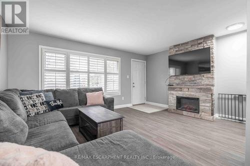 1 - 1025 Upper Gage Avenue, Hamilton, ON - Indoor Photo Showing Living Room With Fireplace
