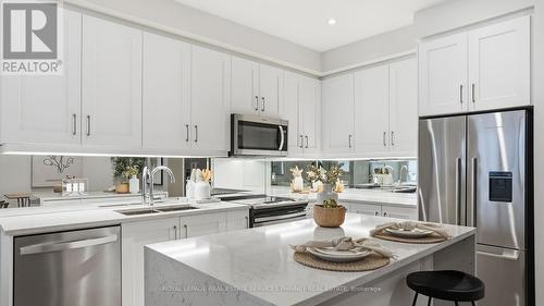 201 - 652 Cricklewood Drive, Mississauga, ON - Indoor Photo Showing Kitchen With Stainless Steel Kitchen With Double Sink With Upgraded Kitchen