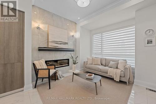 129 High Street W, Mississauga, ON - Indoor Photo Showing Living Room With Fireplace