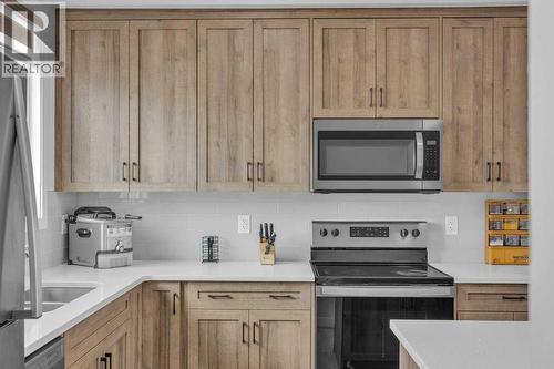 1612 Rangeview Drive Se, Calgary, AB - Indoor Photo Showing Kitchen