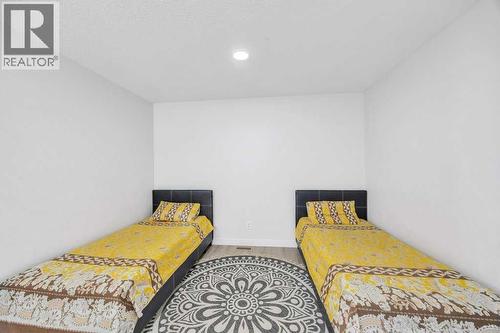 1612 Rangeview Drive Se, Calgary, AB - Indoor Photo Showing Bedroom