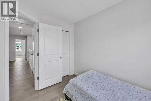 1612 Rangeview Drive Se, Calgary, AB - Indoor Photo Showing Bedroom