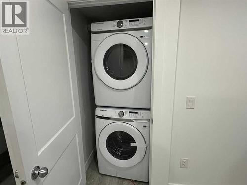 1612 Rangeview Drive Se, Calgary, AB - Indoor Photo Showing Laundry Room