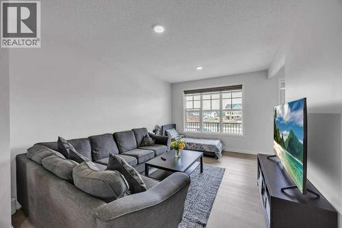 1612 Rangeview Drive Se, Calgary, AB - Indoor Photo Showing Living Room
