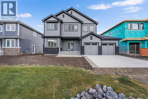 142 Sunstone Way, Balzac, AB - Outdoor With Facade