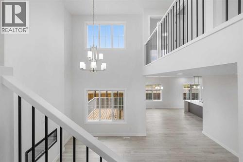 142 Sunstone Way, Balzac, AB - Indoor Photo Showing Other Room