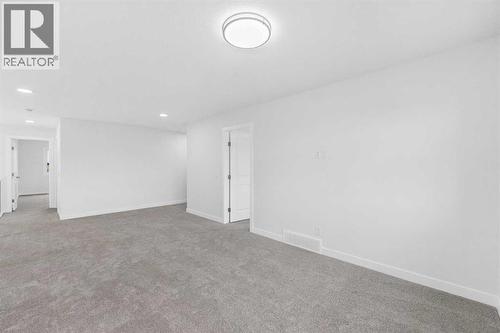 142 Sunstone Way, Balzac, AB - Indoor Photo Showing Other Room