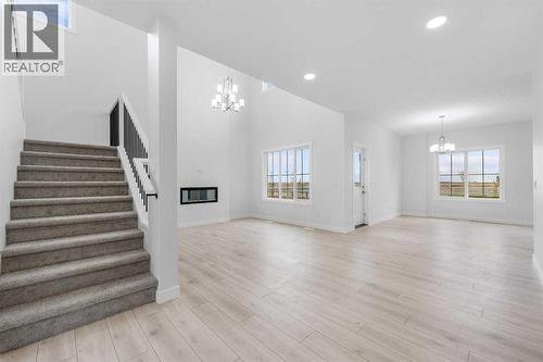 142 Sunstone Way, Balzac, AB - Indoor Photo Showing Other Room