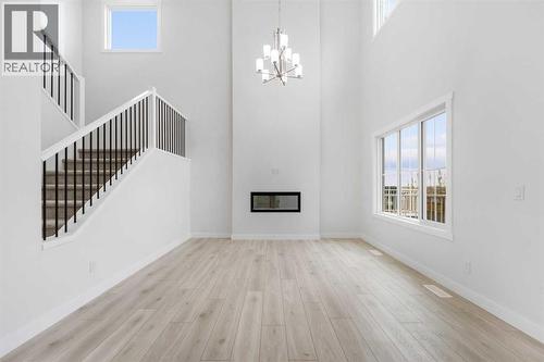 142 Sunstone Way, Balzac, AB - Indoor Photo Showing Other Room