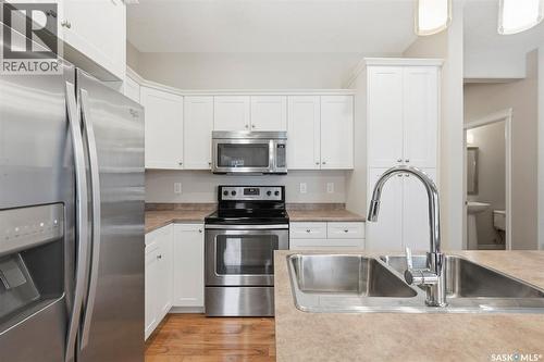 #3 115 Veltkamp Crescent, Saskatoon, SK - Indoor Photo Showing Kitchen With Double Sink