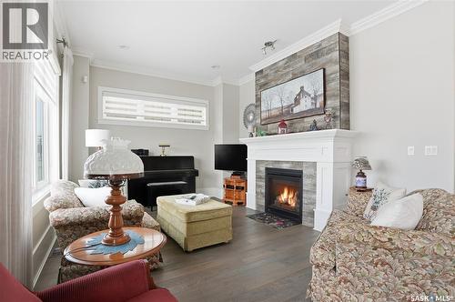 29 115 Meadows Boulevard, Saskatoon, SK - Indoor Photo Showing Living Room With Fireplace