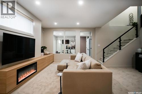 4158 Fieldstone Way, Regina, SK - Indoor Photo Showing Other Room With Fireplace