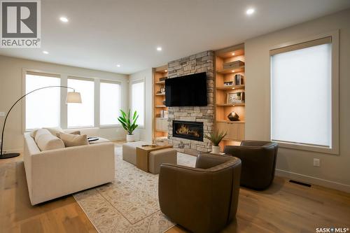 4158 Fieldstone Way, Regina, SK - Indoor Photo Showing Living Room With Fireplace