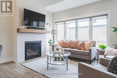 2 - 3573 Dominion Road, Fort Erie (Ridgeway), ON - Indoor Photo Showing Living Room With Fireplace