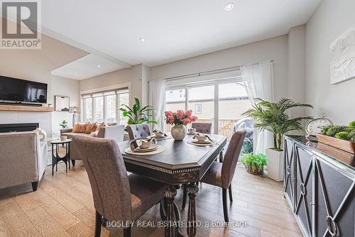 2 - 3573 Dominion Road, Fort Erie (Ridgeway), ON - Indoor Photo Showing Dining Room With Fireplace