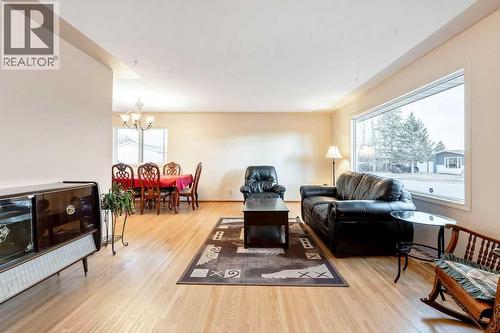 9136 Allison Drive Se, Calgary, AB - Indoor Photo Showing Living Room