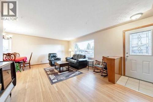 9136 Allison Drive Se, Calgary, AB - Indoor Photo Showing Living Room