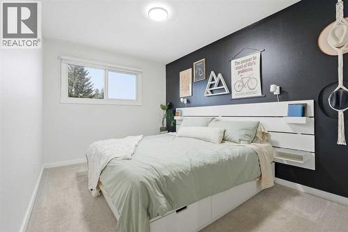 Primary Bedroom with walk in closet and 5pc ensuite - 711 101 Avenue Sw, Calgary, AB - Indoor Photo Showing Bedroom