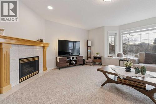 328 Douglas Glen Heath Se, Calgary, AB - Indoor Photo Showing Living Room With Fireplace
