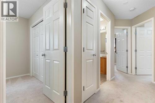 Upper hallway - 129 Evansbrooke Way Nw, Calgary, AB - Indoor Photo Showing Other Room