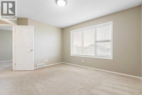 Primary bedroom - 129 Evansbrooke Way Nw, Calgary, AB - Indoor Photo Showing Other Room