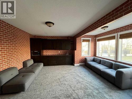 75 Royal Abbey Rise Nw, Calgary, AB - Indoor Photo Showing Living Room
