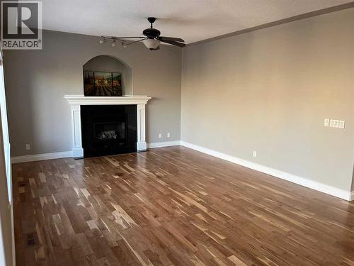 75 Royal Abbey Rise Nw, Calgary, AB - Indoor With Fireplace