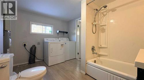 Bathroom/Laundry combo! - 622 5 Avenue, Wainwright, AB - Indoor Photo Showing Laundry Room