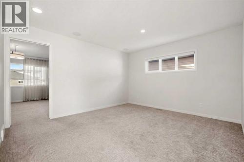 110 Wolf Creek Rise Se, Calgary, AB - Indoor Photo Showing Other Room